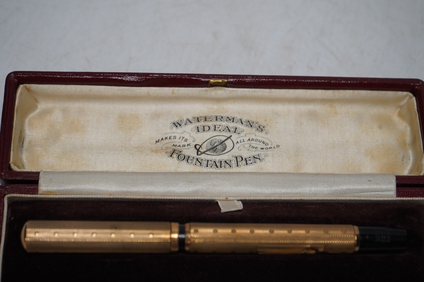 A Waterman's Ideal self-filling fountain pen with 9ct gold overlay, in original box with paperwork. Condition - good